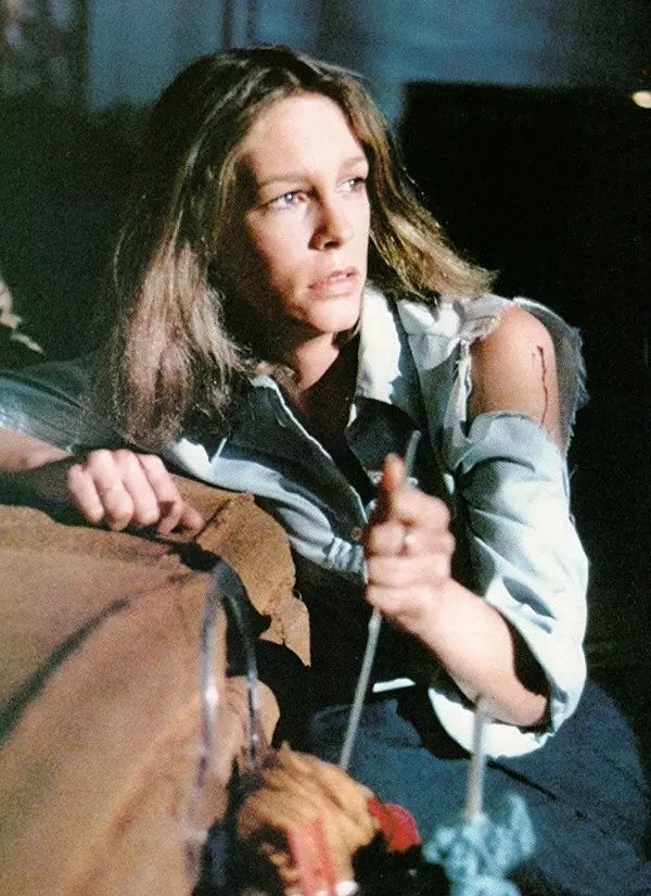 a still of Jamie Lee Curtis from the horror film Halloween
