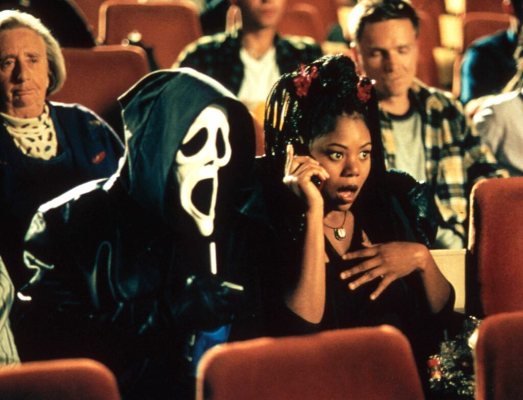 A still of Regina Hall and Ghost Face in the horror movie spoof, Scary Movie