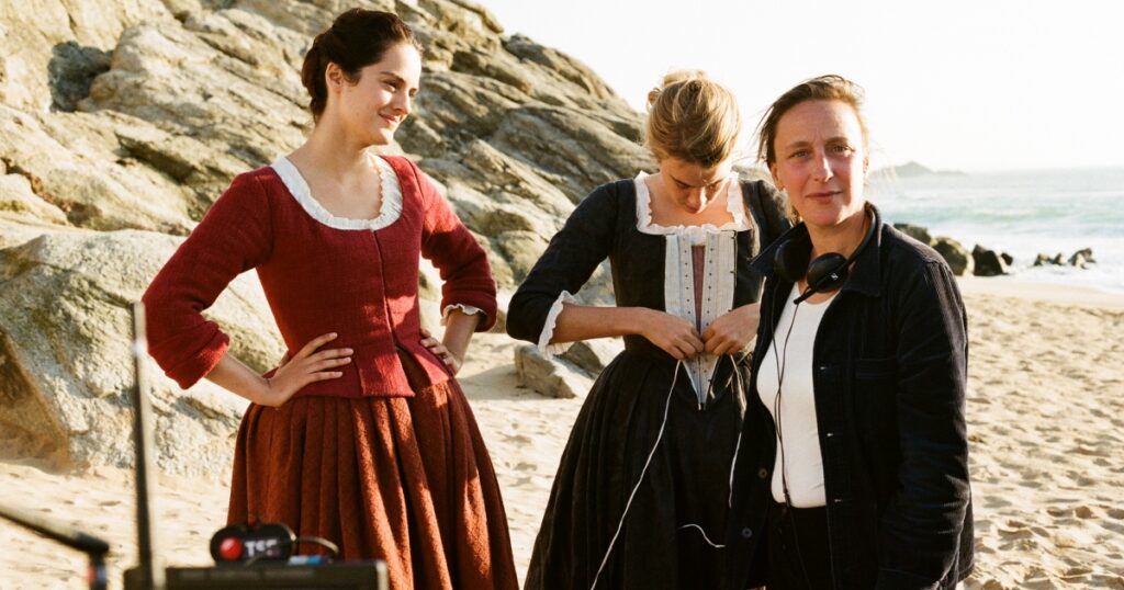 still of Celine Sciamma, Noémie Merlant and Adèle Haenel on the set of Portrait of a Lady on Fire