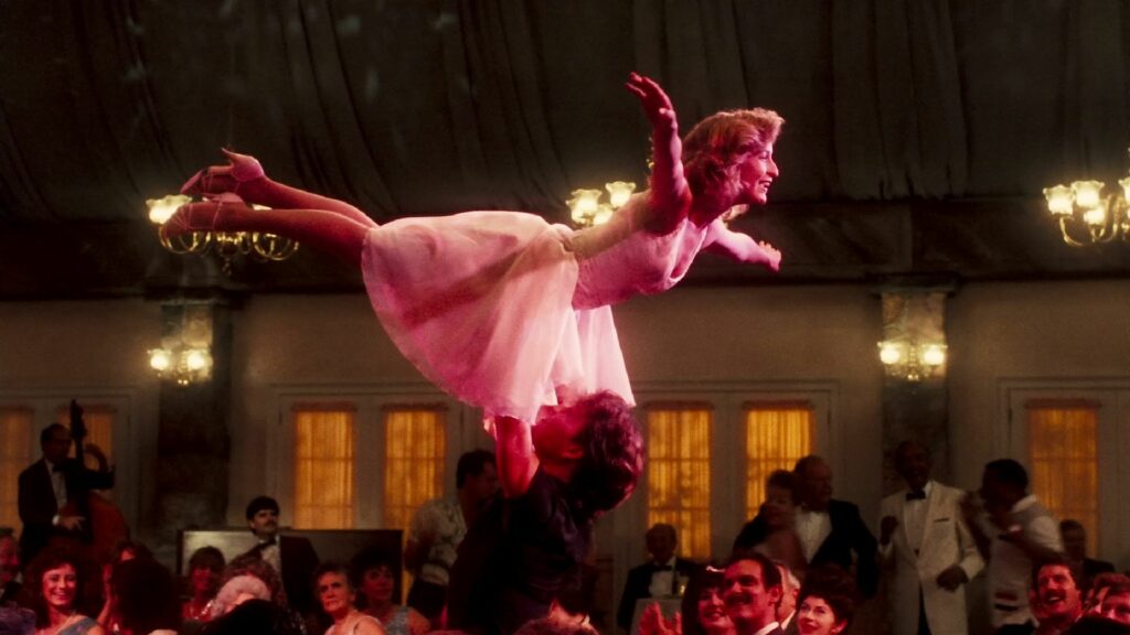 Patrick Swayze and Jennifer Grey doing the iconic lift in the classic movie Dirty Dancing